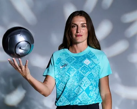 Alexia Putellas holds a silver football in one hand during her presentation as a London City Lionesses player.