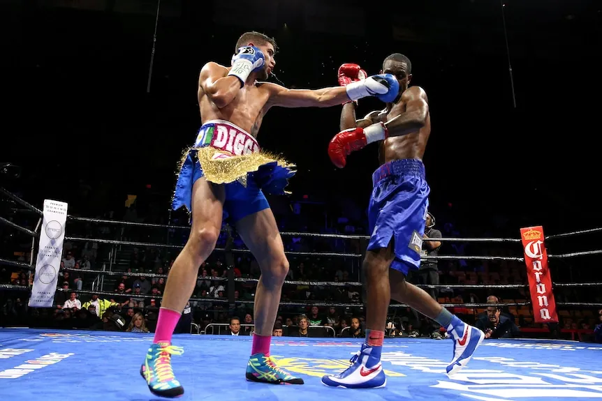 Prichard Colon and Terrel Williams fighting in a boxing ring